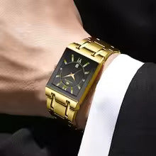 Side view of men's rectangular black gold watch with gold-tone stainless steel bracelet