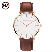Hannah Martin unisex rose gold watch with Japanese quartz leather and nylon strap dress watch