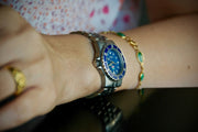 Ladies luxury watch worn with jewellery