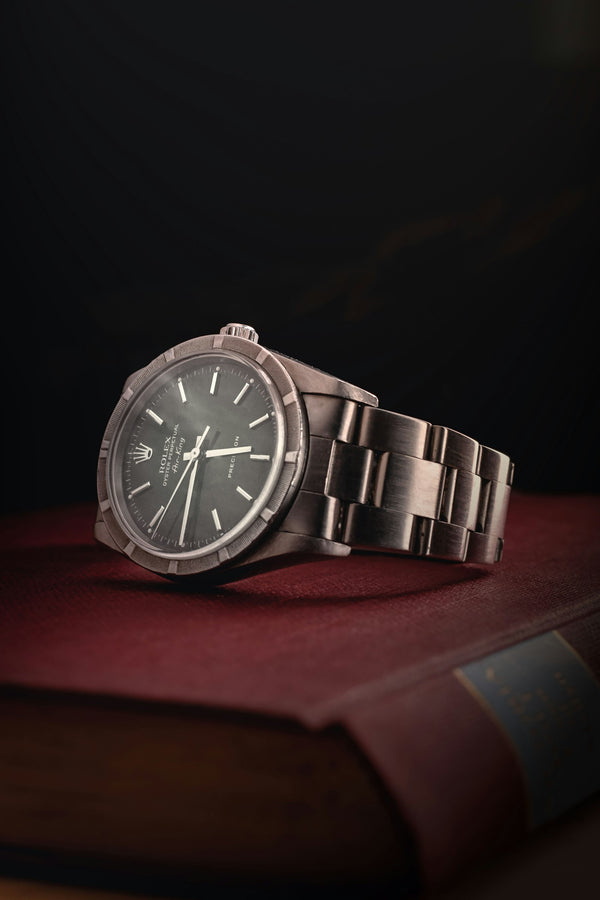 TAG Heuer steel watch with dark dial