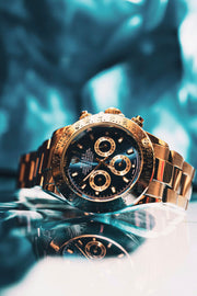 Luxury chronograph watch with dramatic backdrop
