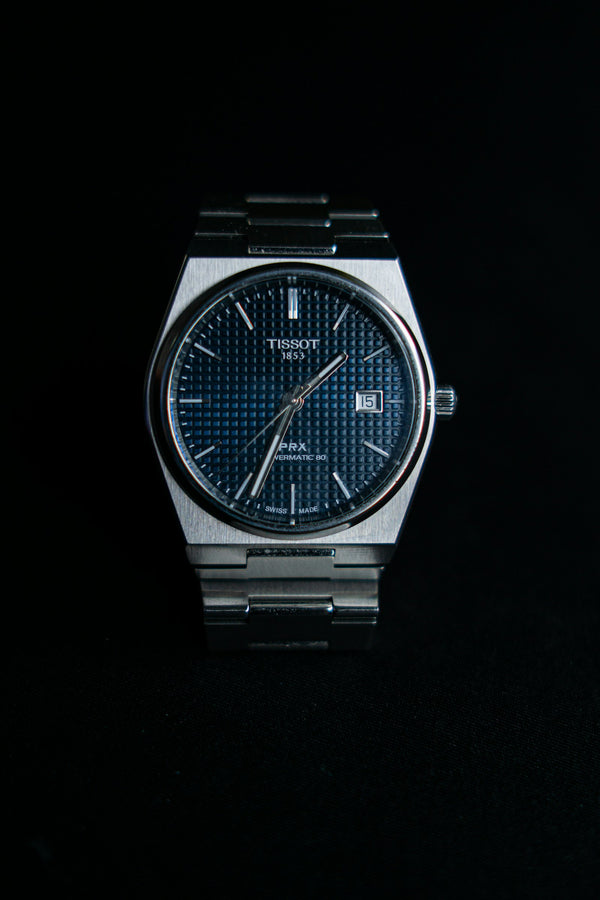 Tissot PRX with blue dial and integrated bracelet