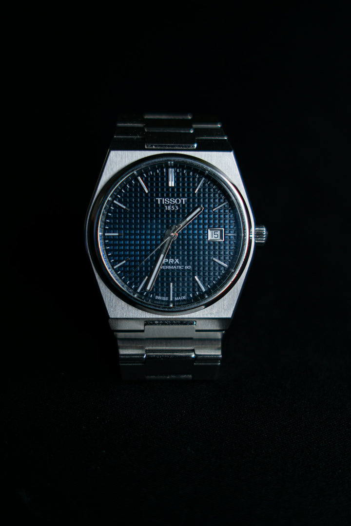 Tissot PRX with blue dial and integrated bracelet
