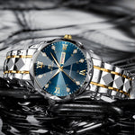 Load image into Gallery viewer, Close-up of blue gold stainless steel luxury men's watch with water diamond bezel and luminous markers